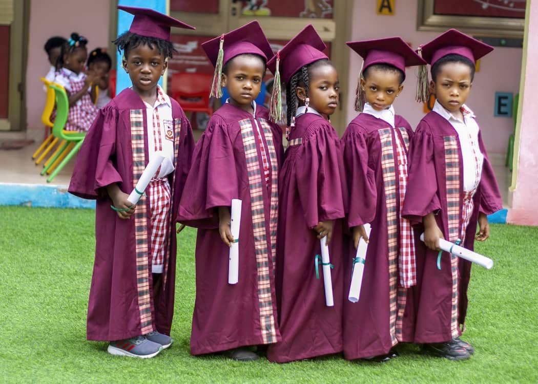 The graduating class with fellow pupils at the promotion ceremony
